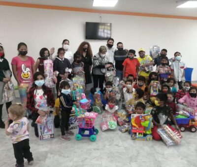 Niños de CAFI reciben regalos por parte de empresarios y trabajadores de centro comercial  